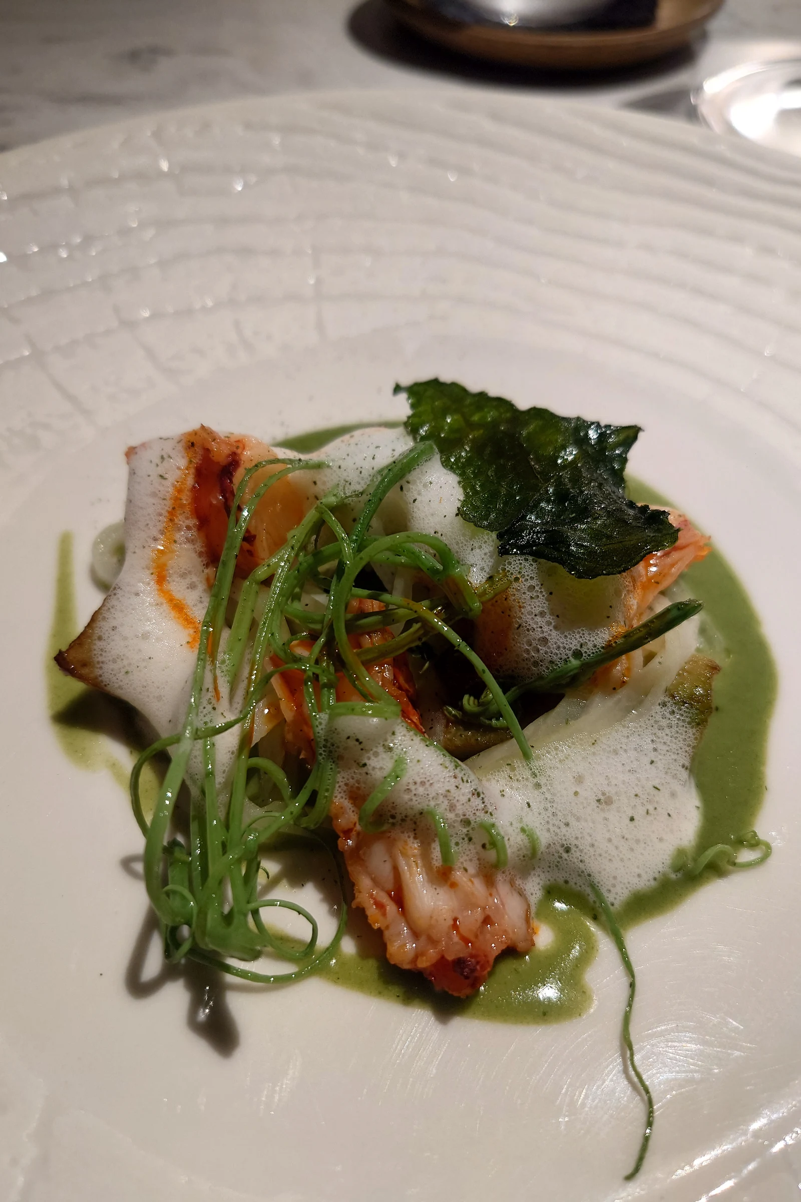 LASAI のモダンブラジル料理の一皿。ワインペアリングの中に日本酒が自然に組まれていた